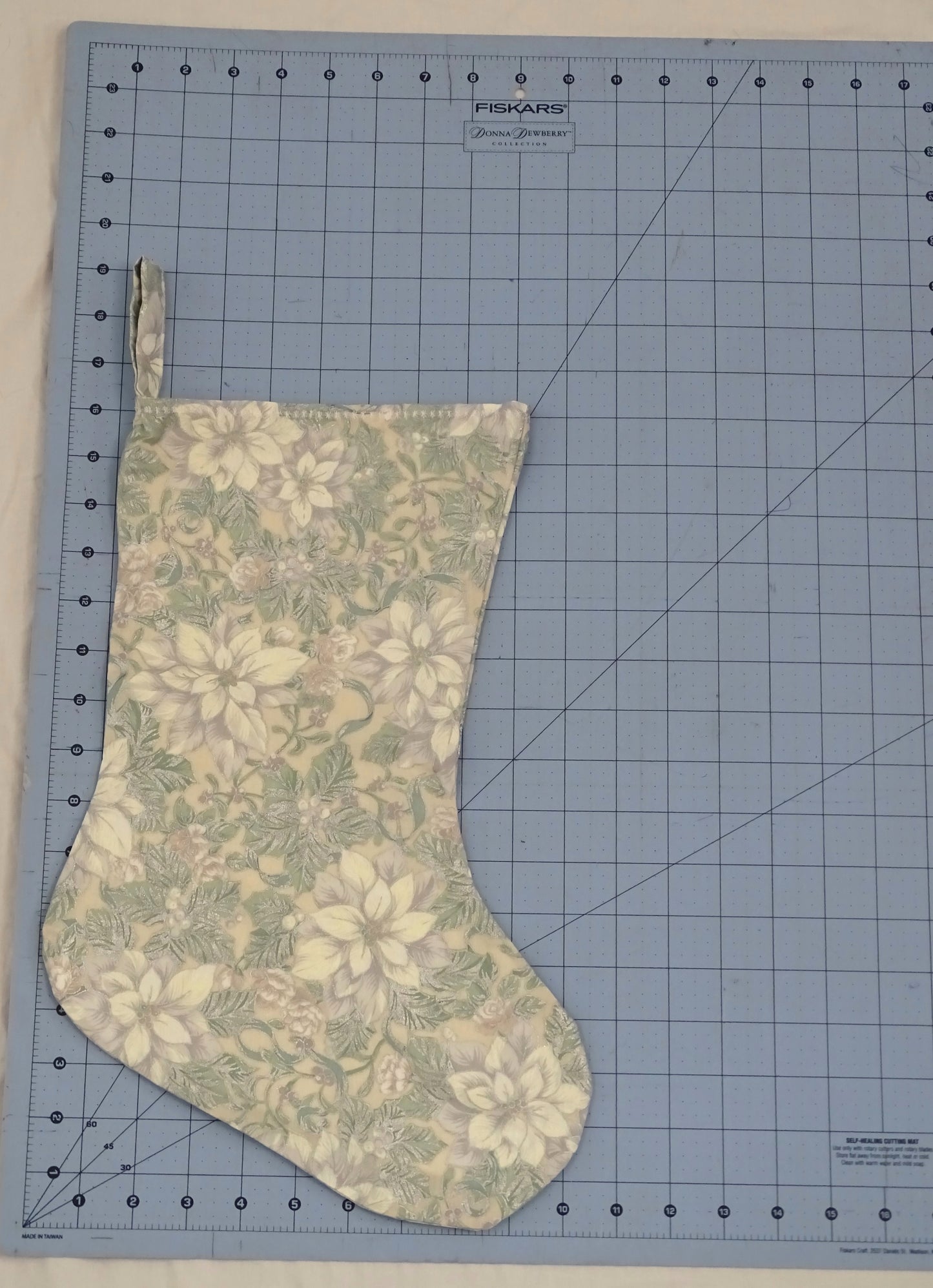 Silver Poinsettia Print Stocking