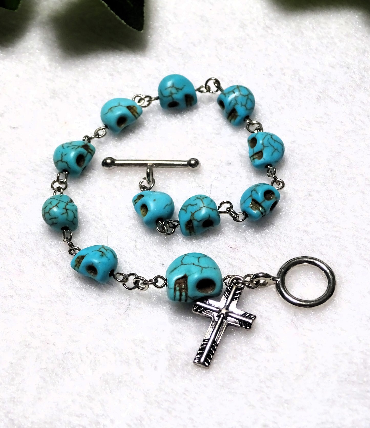 Turquoise Dyed Howlite Skull Rosary Bracelet